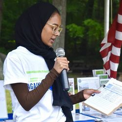 Sura Hassoun, MPH '23, MSOT '22, speaking at the Against the Tide Run, Swim, Walk event
