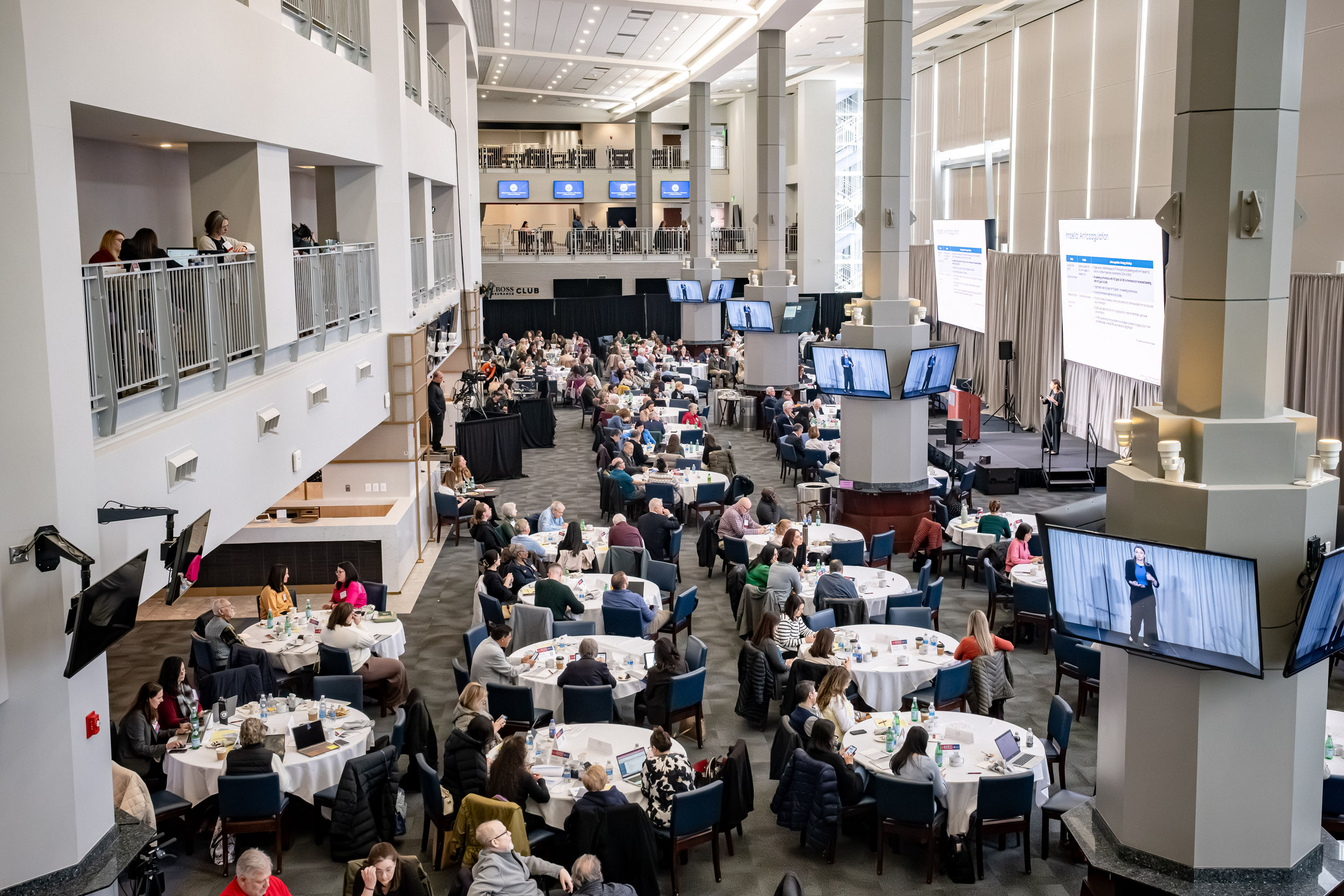 People sit at tables at the 2026 Reed Conference