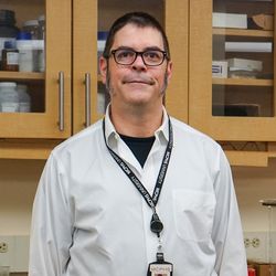  Matthew Metcalf, PharmD, PhD, in his lab on the MCPHS Worcester Campus.