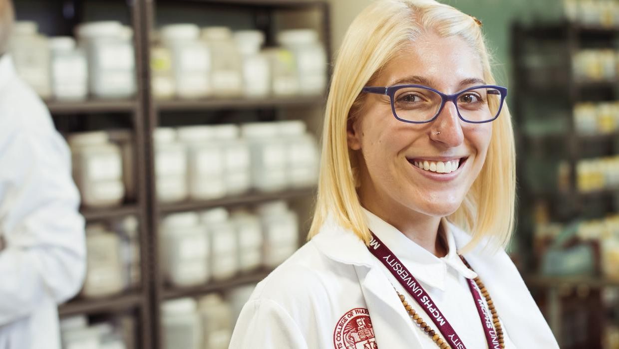 Smiling female acupuncture student