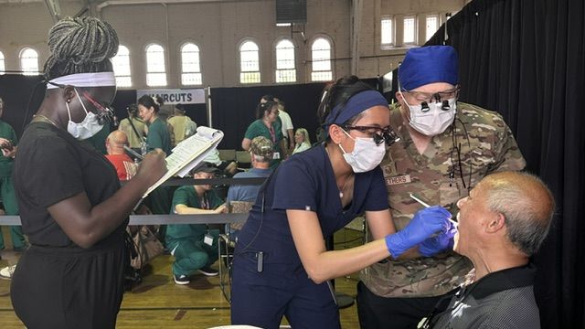 MCPHS dental hygiene students and faculty at the Veterans StandDown event.
