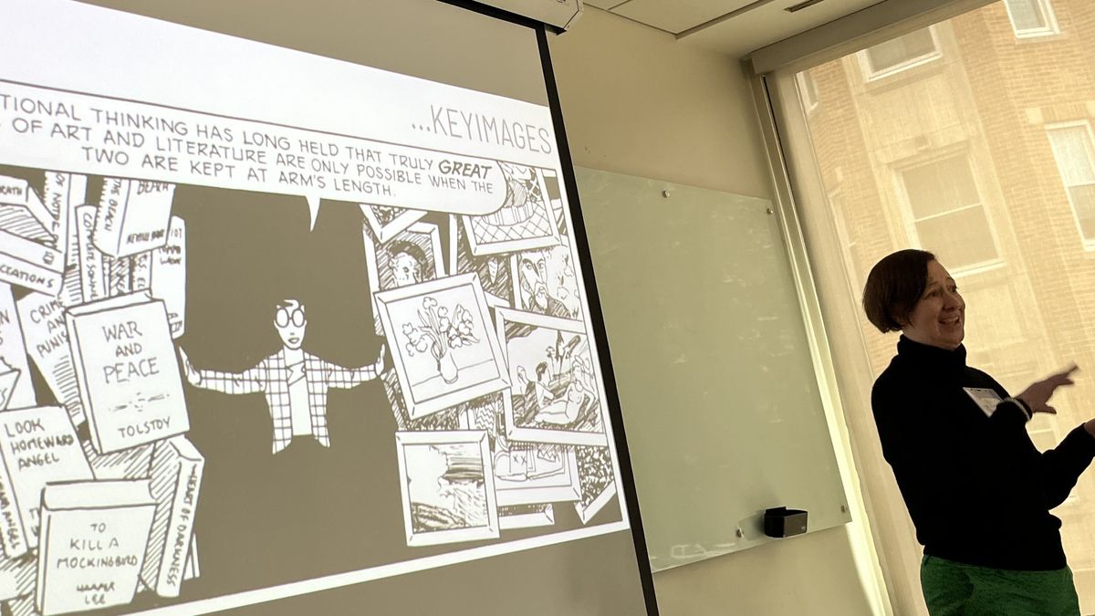 Briana Martino stands in front of a screen 