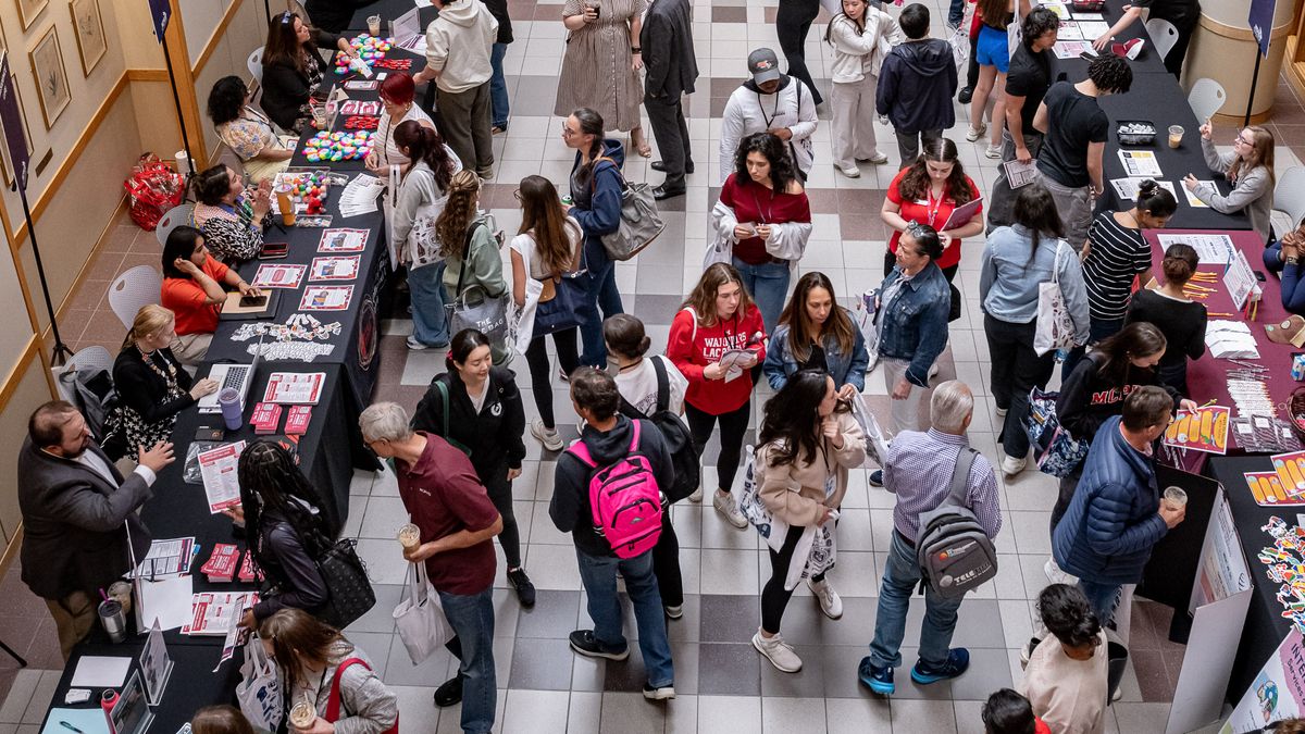 Large group of people at an MCPHS event. 