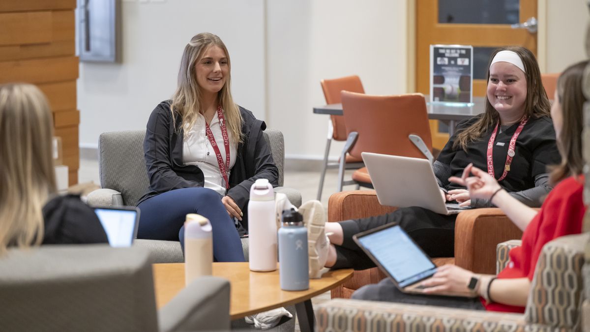 Manchester students hanging out and studying in the Brant Hub on the Manchester Campus. 