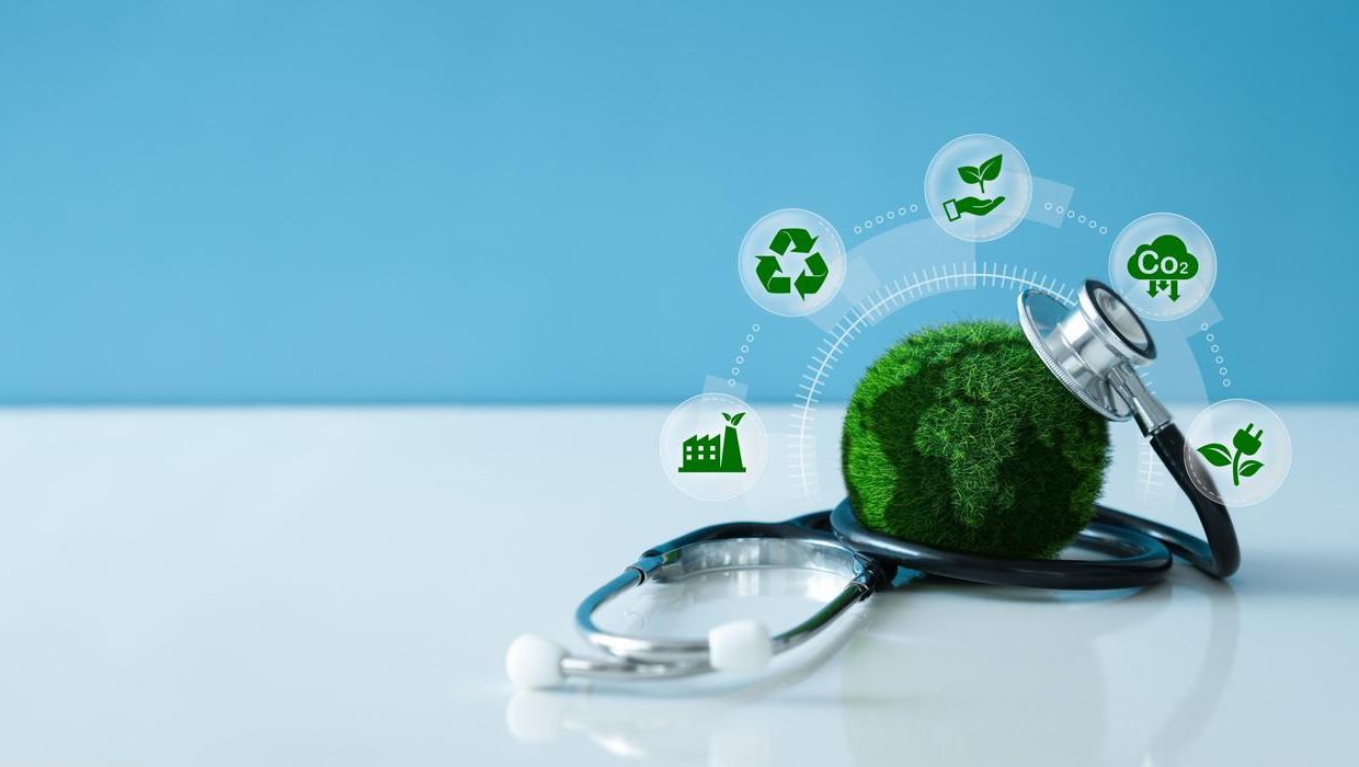 Green Earth and a stethoscope with Saving the environment and environmentally sustainable icon. 