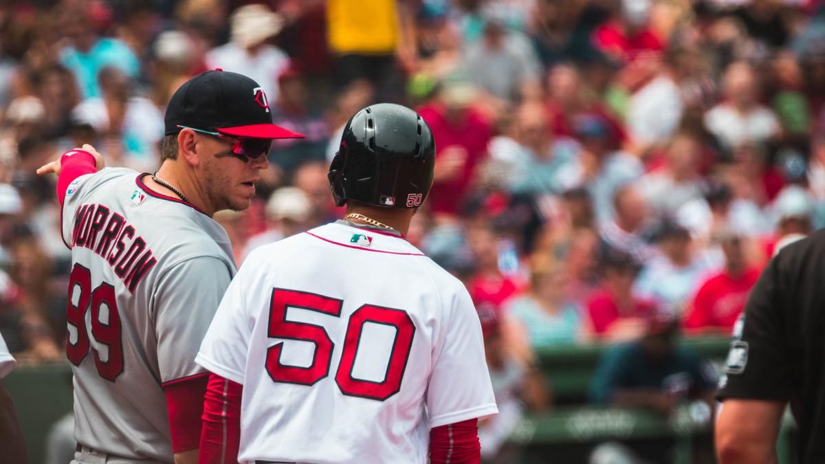 Two Worcester Red Sox Players talking on the field. 