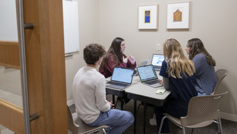 Manchester students hanging out and studying in the Brant Hub on the Manchester Campus. 