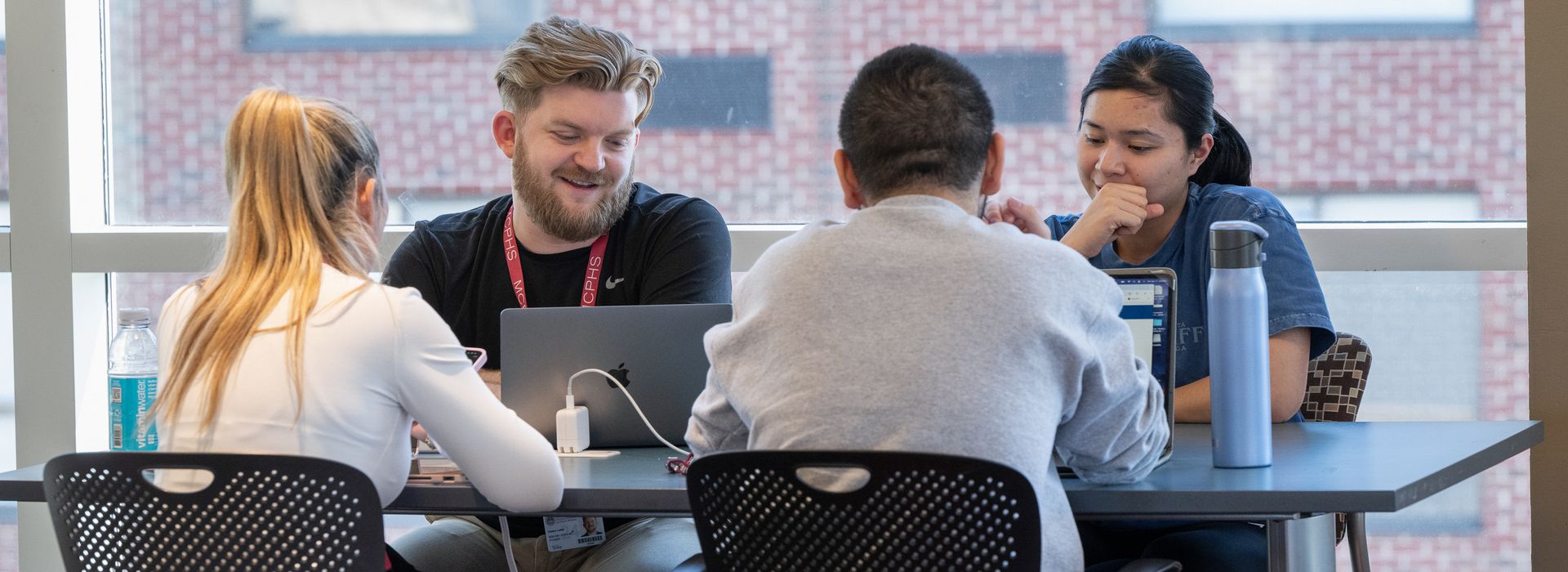 MCPHS students with laptops. 