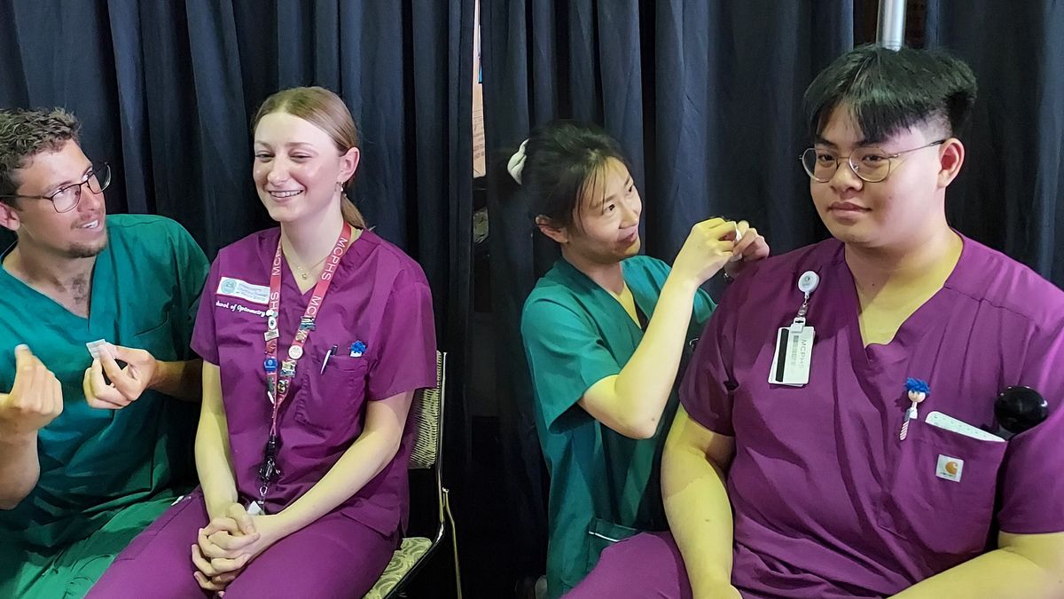 MCPHS Acupuncture students at the Veterans StandDown event.