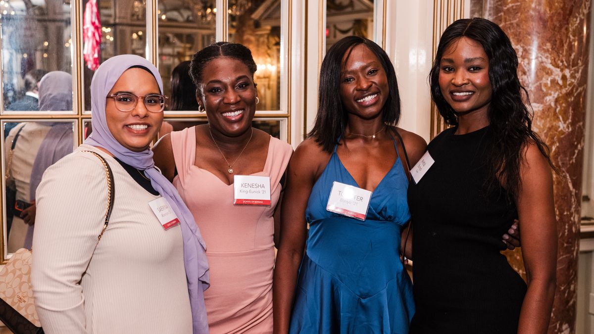 Four women at an MCPHS reunion.