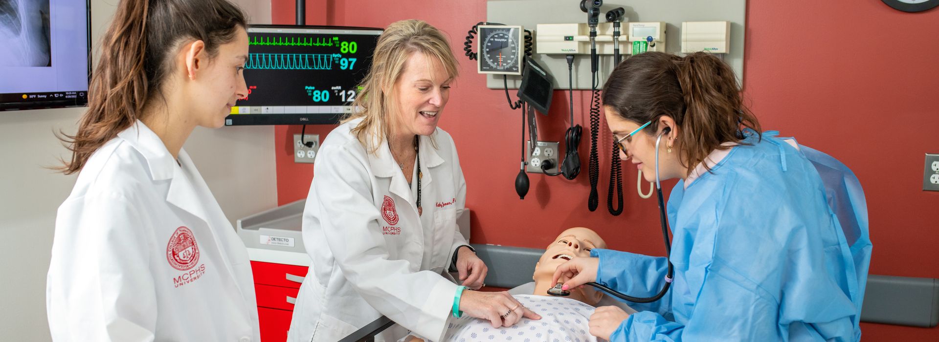 PA student with Faculty in clinical setting.