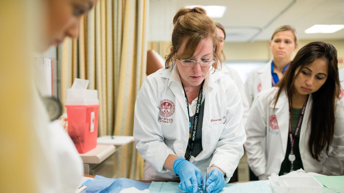 Physician Assistant Studies faculty and students in the PA Simulation lab.