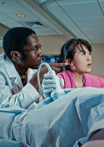 Student in MCPHS Diagnostic Medical Sonography lab.