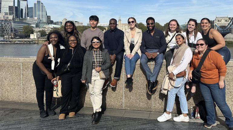 Students near the Tower Bridge in London.