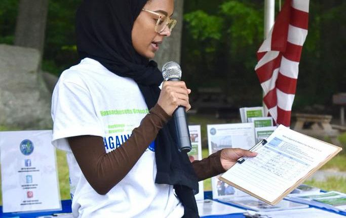Sura Hassoun, MPH '23, MSOT '22, speaking at the Against the Tide Run, Swim, Walk event