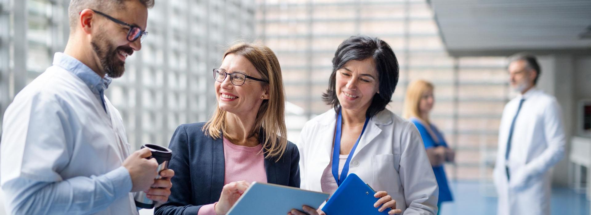 Men and women in a healthcare setting