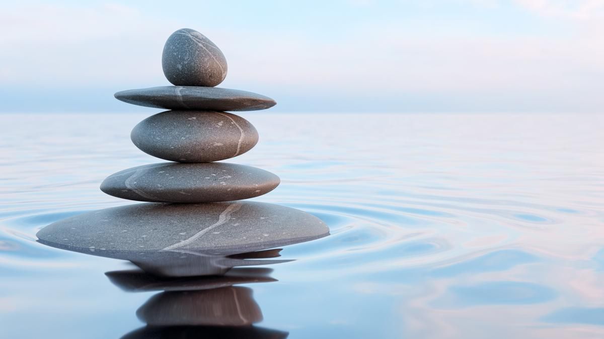 Rocks stacked on a beach. 