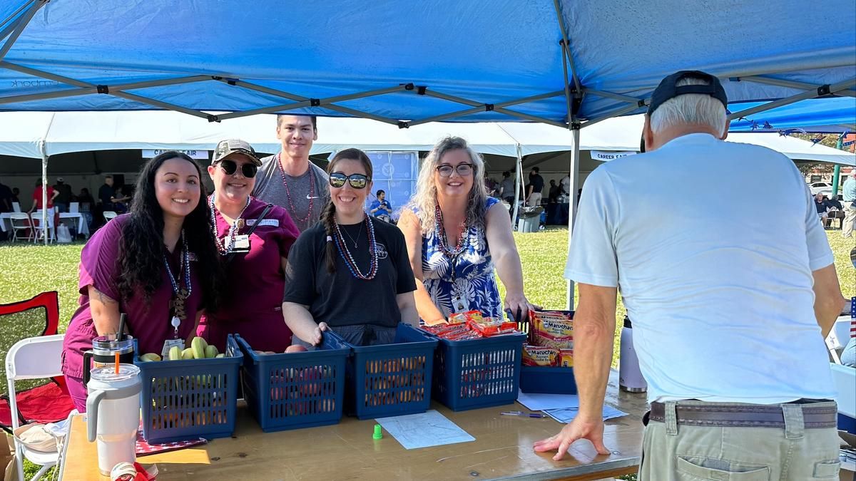 School of Nursing students Amber Dumas, Gabriella Woodward and Jamieson Gateb along with Professors Erica Bush and Catherine Carroca participated in the 19th annual Stand Down veterans event in Worcester.