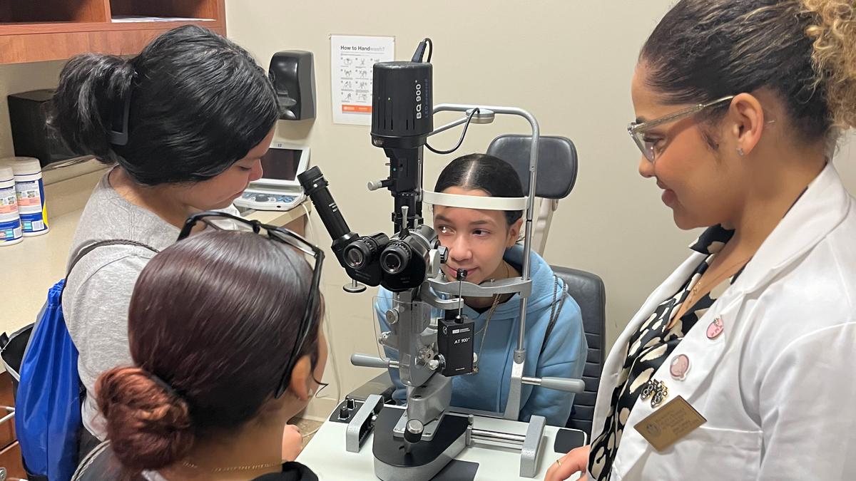 A girl gets her eyes checked during a recent field trip.