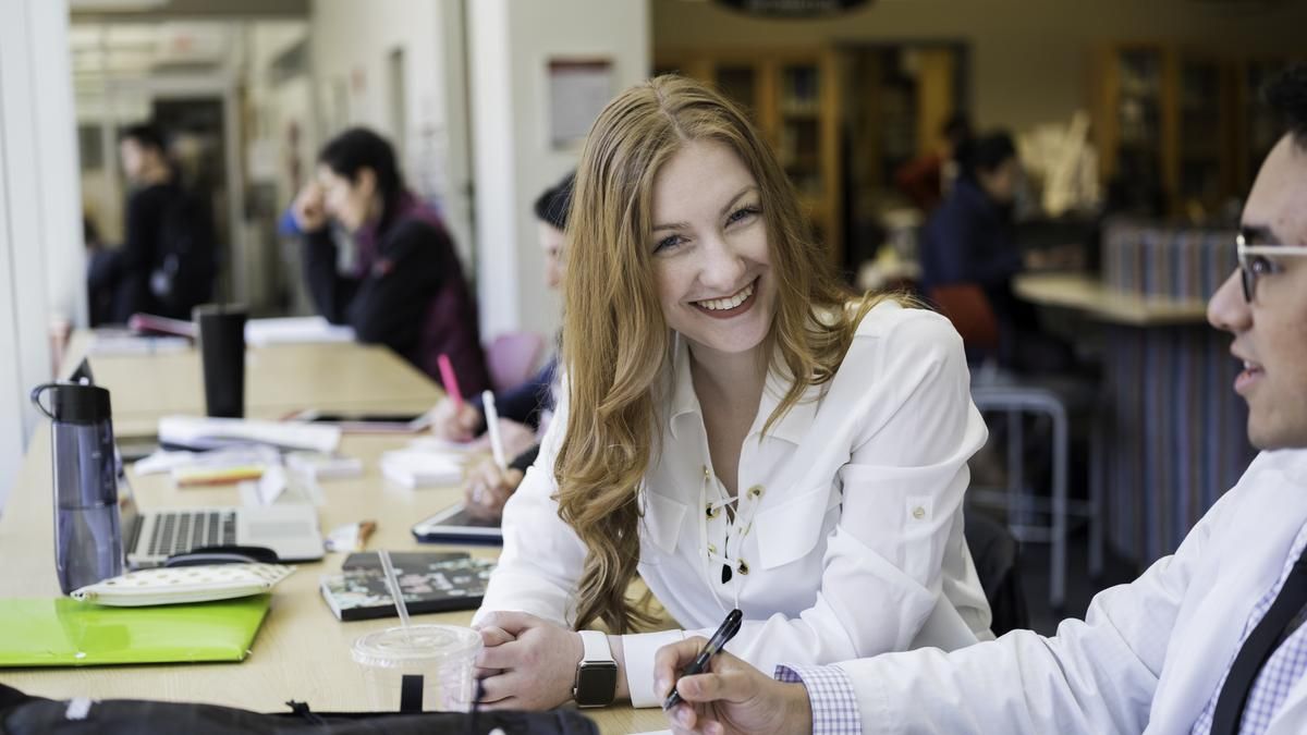 Smiling female student. 