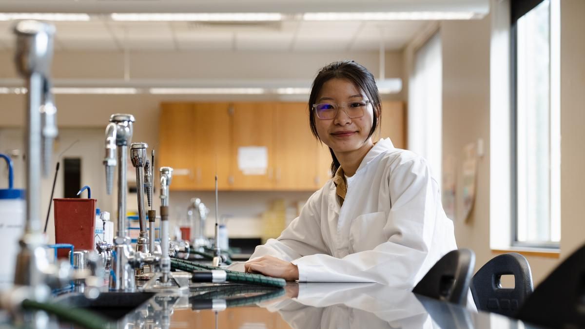 Tran Van sitting in the lab. 