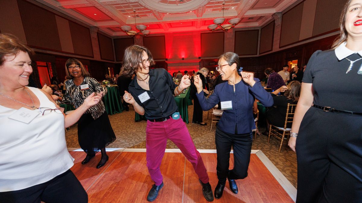 People dancing at the NESA reunion.