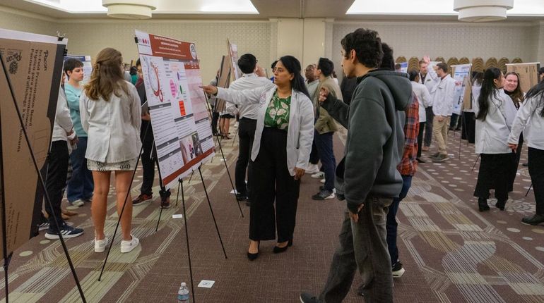 Students at the MCPHS Research & Scholarship Showcase