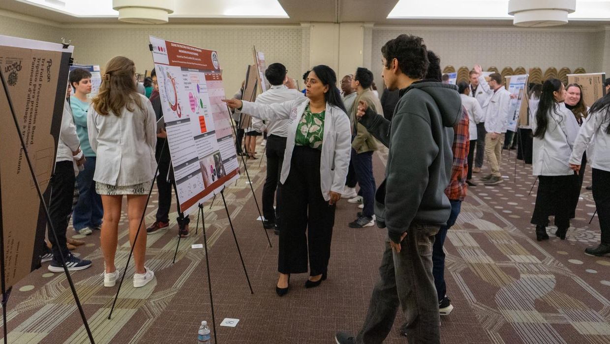 Students at the MCPHS Research & Scholarship Showcase