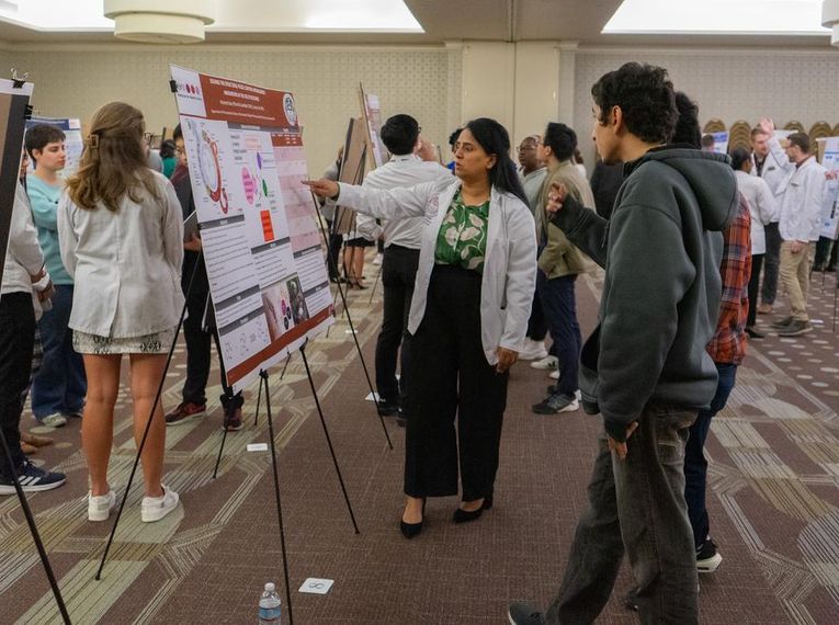Students at the MCPHS Research & Scholarship Showcase