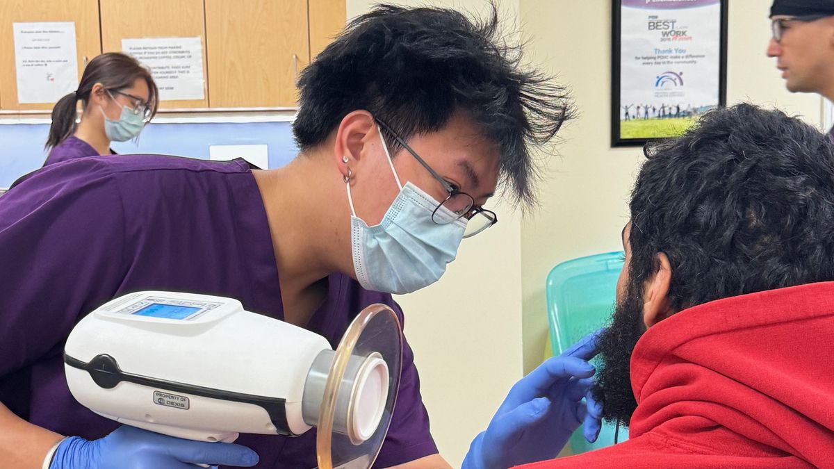 Gary Luo, Bachelor of Science in Predental-Dental Hygiene '25, was one of nine students from the Forsyth School of Dental Hygiene at Massachusetts College of Pharmacy and Health Sciences to volunteer at the Rhode Island Mission of Mercy dental clinic in Providence Oct. 4-5.