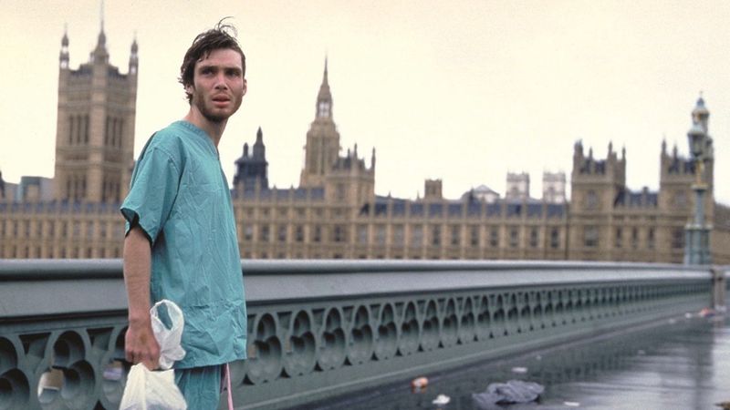 Cillian Murphy stands in London.