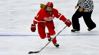 Brittany Moore playing ice hockey