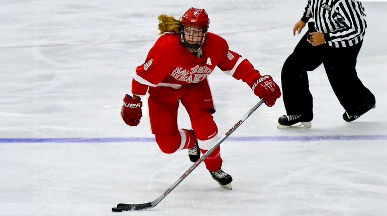 Brittany Moore playing ice hockey