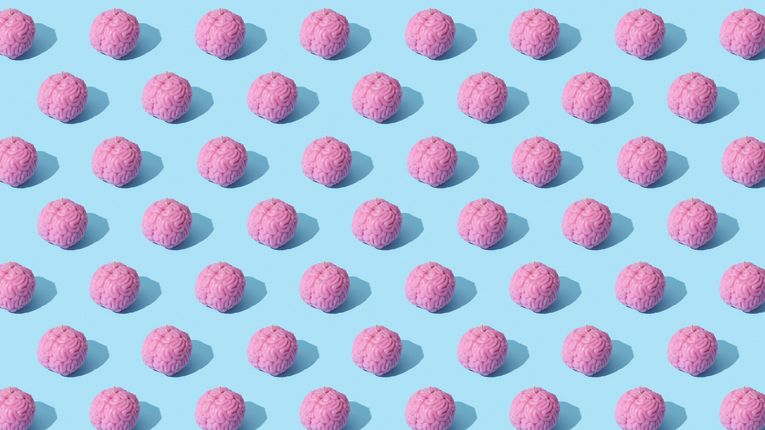 Repeating pattern of pink, brain-like objects on a light blue background