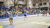 Bob Cargill crosses the finish line at the Boston Marathon.