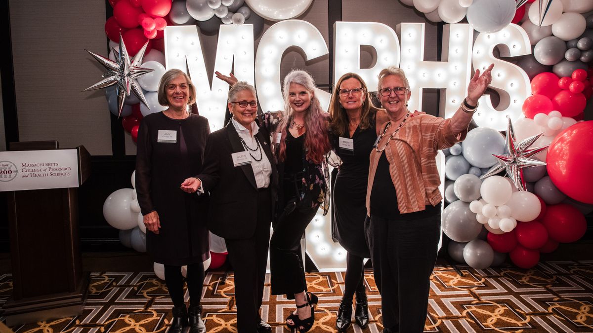 NESA alumni at a reunion event. 