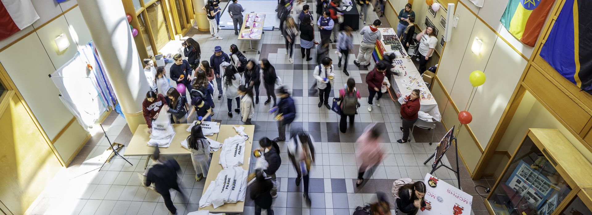 aerial view of students at an event on the MCPHS Boston campus. 