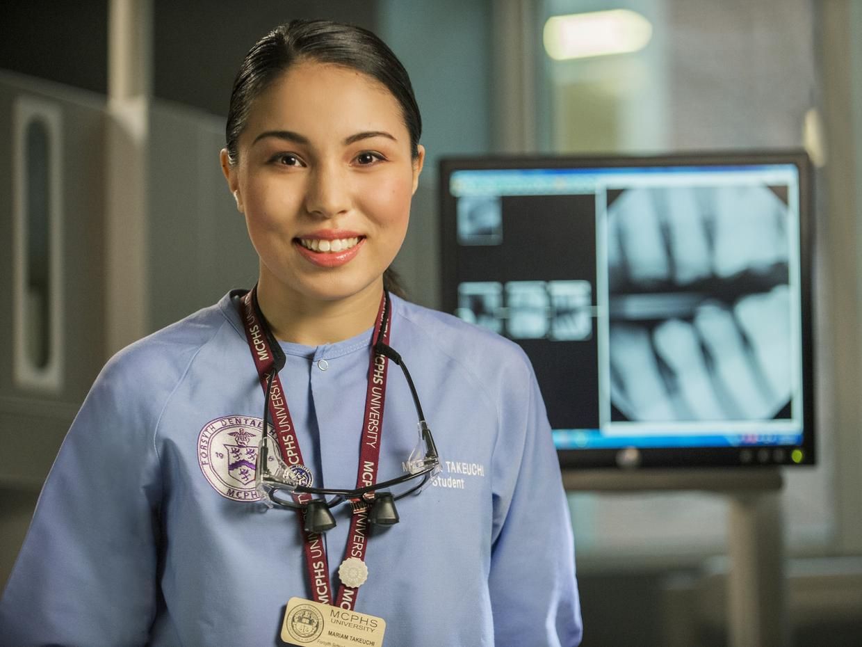 Smiling student in the Dental Hygiene Lab. 