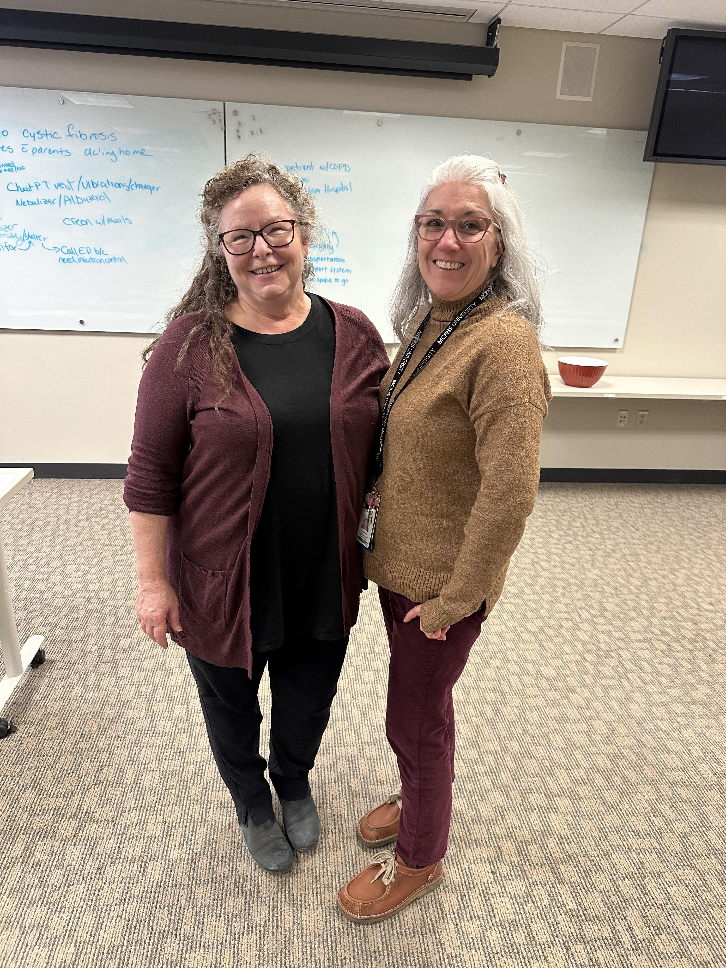 MCPHS nursing alum Cynthia Nichols, left, and Assistant Professor Carla Smith.