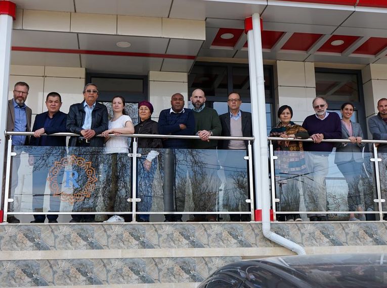 Marc Nascarella and other people at a hotel in Kyrgyzstan