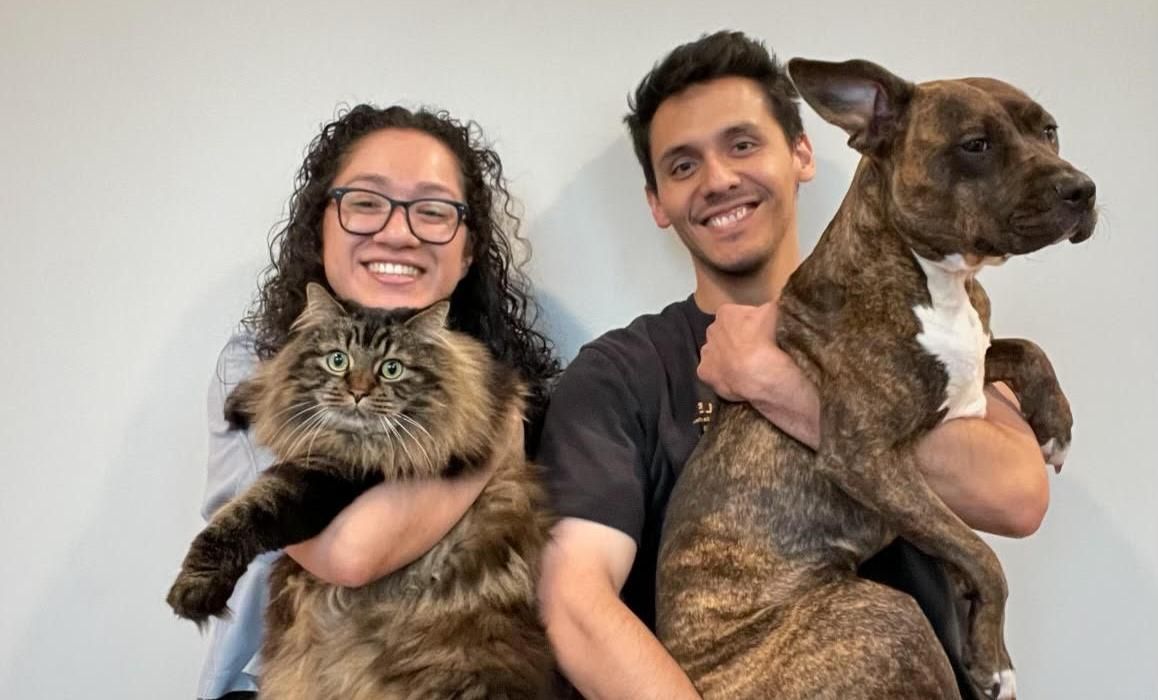 Eva Nazariega with her fiance, Henry, and their pets.