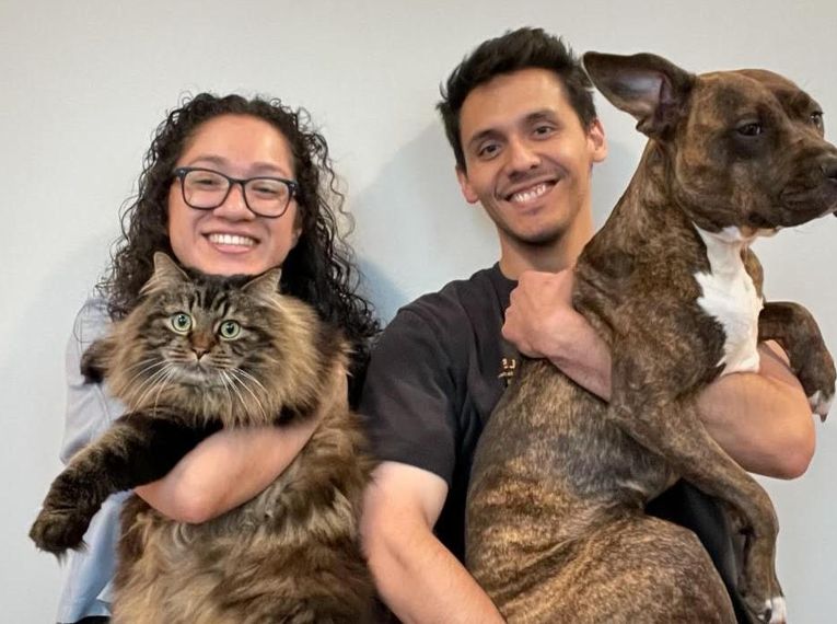 Eva Nazariega with her fiance, Henry, and their pets.