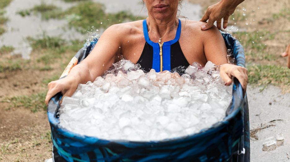 Woman Sits in Ice Bath