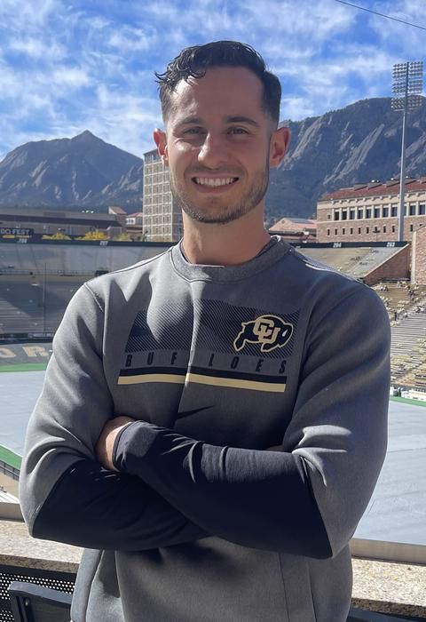 Anthony Videtto, DPT, '23 in front of University of Colorado stadium. 