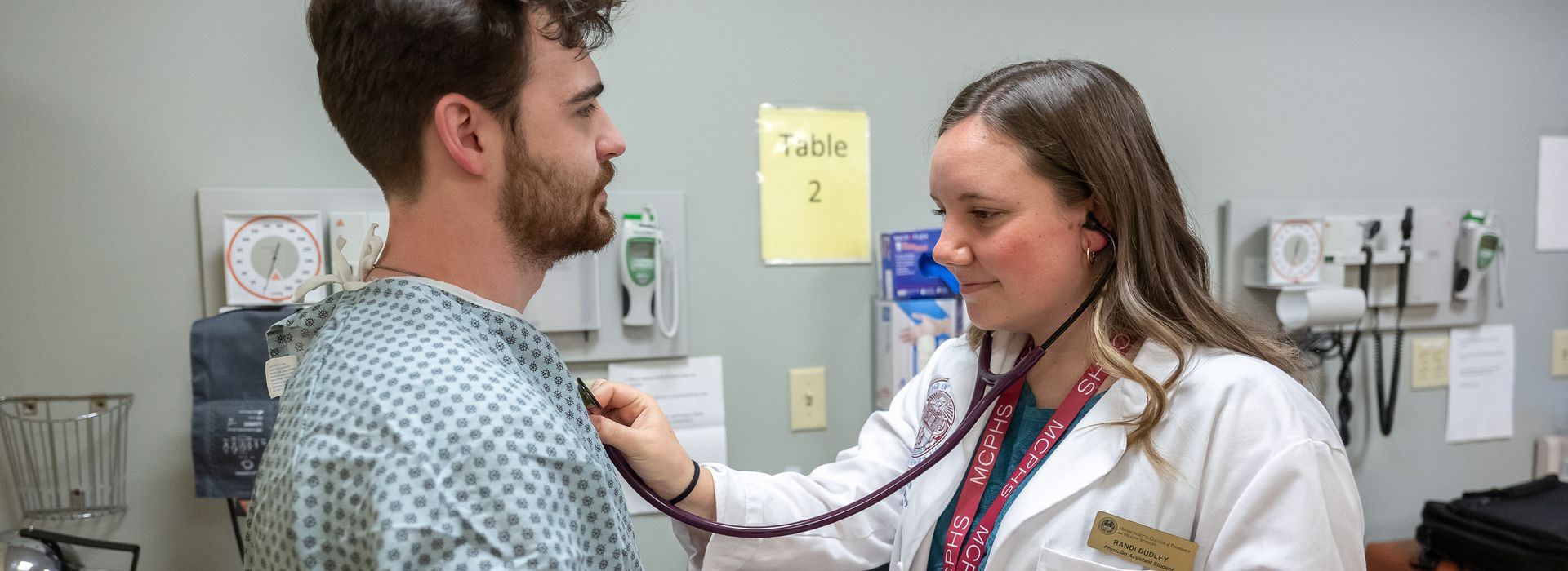 Physicians Assistant student with stethoscope in the PA lab.