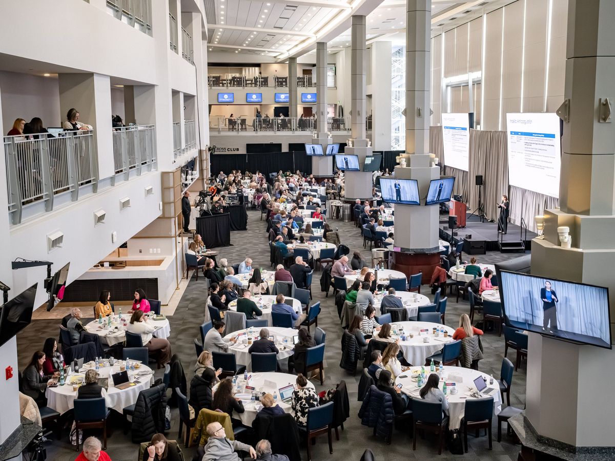 People sit at tables at the 2026 Reed Conference