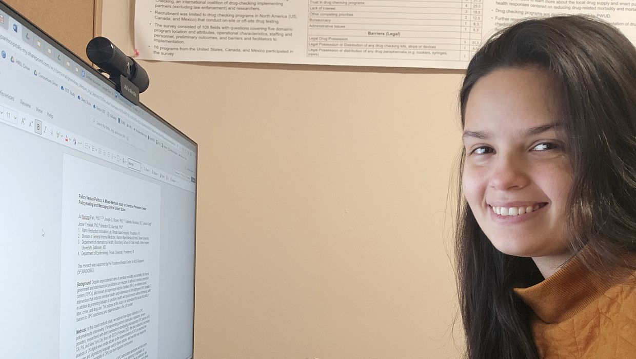 Gabrielle Riendeau sits in front of her computer.