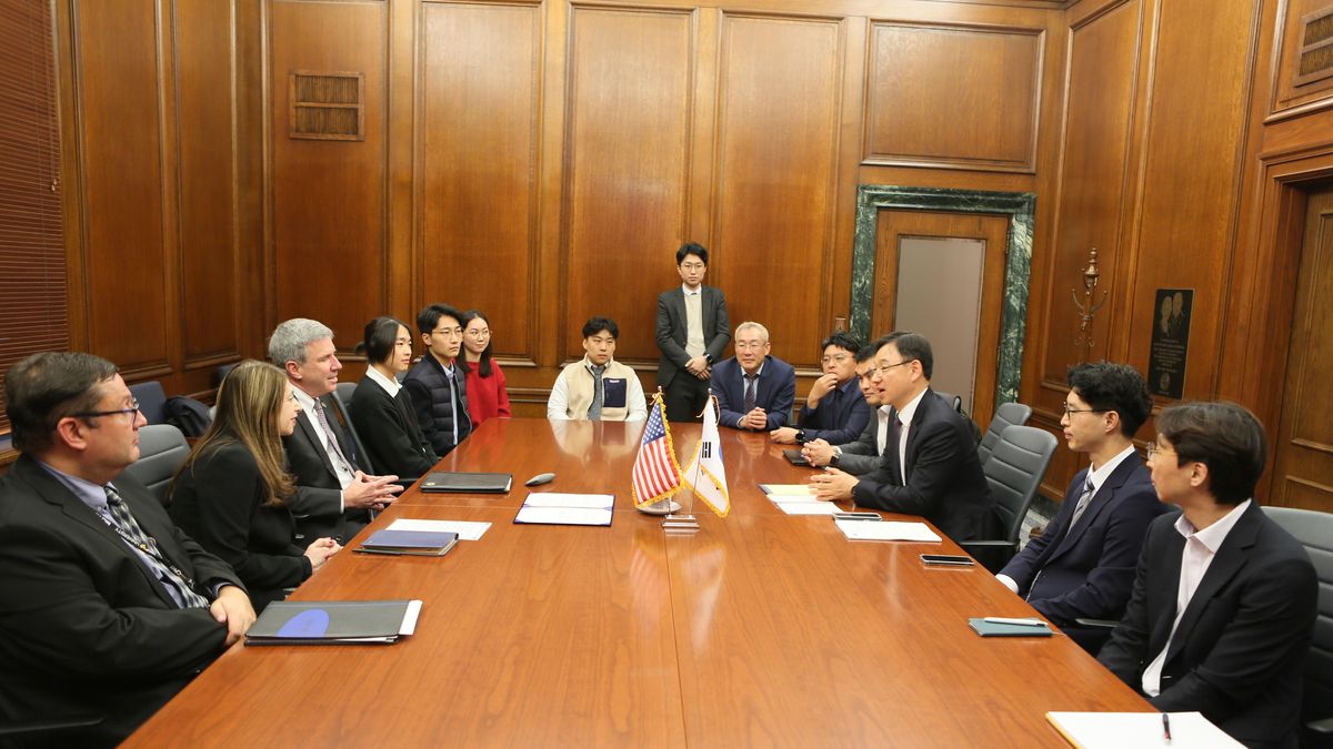 The KEIT delegation and MCPHS leadership in sitting around a table. 