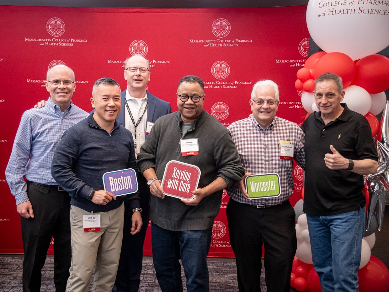 6 men posing for photo at the Reed Conference.