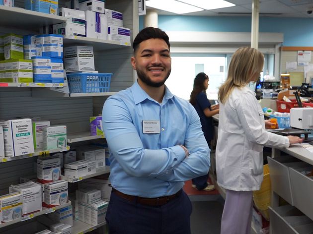 Muhammad Elsweesy standing in a pharmacy.